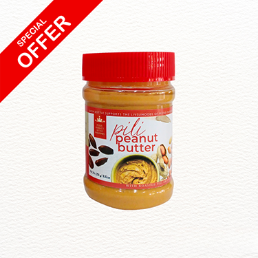 Simbag peanut butter with pili chunks in a sealed jar with red lid